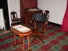 The actual table and chair used by Gen. Grant to sign the surrender.