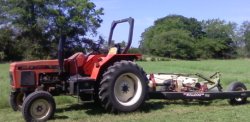 This tractor and mower have been my latest volunteer work.