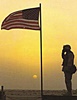 The flag flying over a military post in Afganistan.