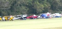 Tents and airplanes make for a colorful campground.