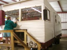 This early, home built, motorhome is displayed. All items in it work.