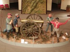 Field artillery in action display in the museum.